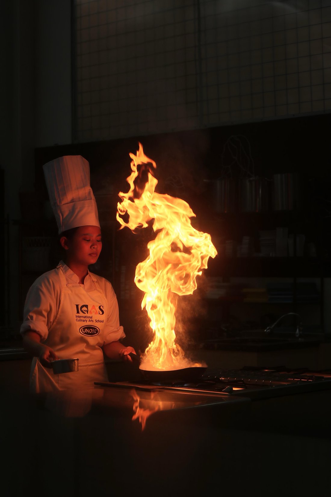 ICAS chef plating a dessert